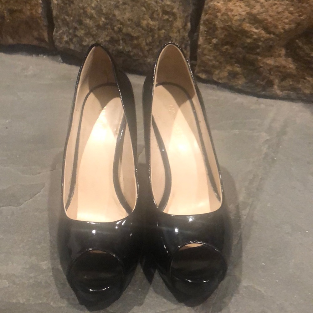 Black patent leather peep toe heels with platform